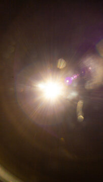 Sun flare on the black background