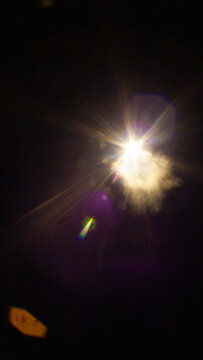 Sun flare on the black background