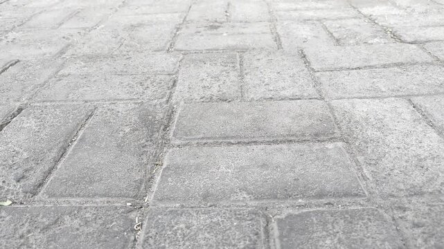 Traditional paving stone street surface texture close up