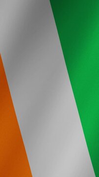 Realistic flag of c&ocirc;te d'ivoire, also known as ivory coast, waving in the wind. Detailed fabric texture and seamless looping animation