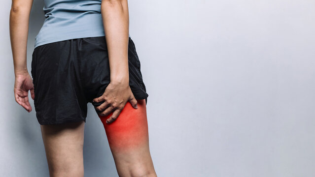 Rear View Woman Holding Painful Hamstring Thigh Muscle Concept