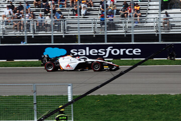 Fototapeta premium May 24, 2026, Montreal, Canada, Esteban Ocon races a Haas F1 car at Circuit Gilles-Villeneuve. g.