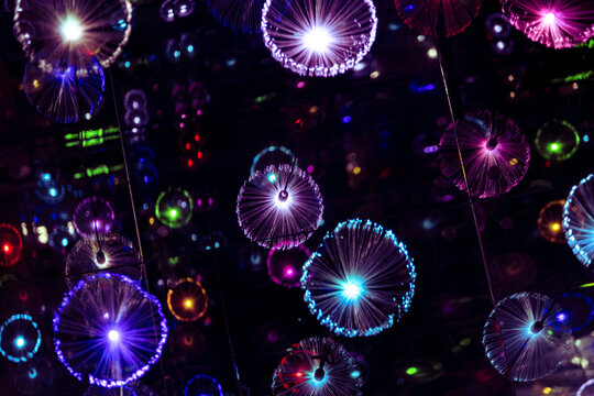immersive space glowing geometric shapes, lights, and mirrors, geometric shapes floating nearby, abstract cosmic backdrop