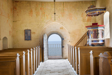 Interior of old Højerup Church at the top of the collapsed into the sea Cliff of Stevns, Denmark