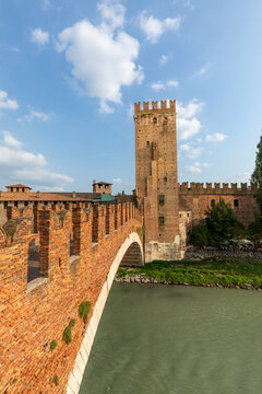Adige River and fortified  historic Castelvecchio Bridge, also known as the Scaliger Bridge or Ponte Scaligero, Verona,