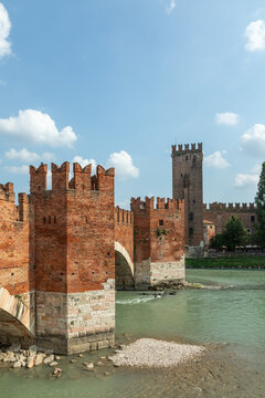 Adige River and fortified bridge Verona Castel Vecchio Bridge - Ponte di Castelvecchio or Ponte Scaligero, Verona, Italy