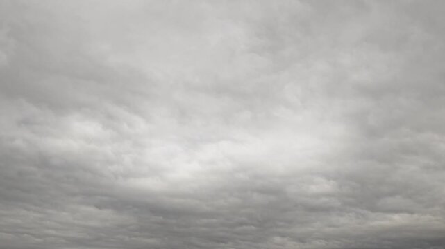Dark stratocumulus clouds light up