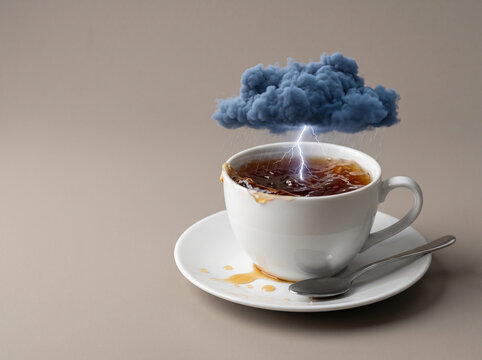 Storm in a teacup: tiny thundercloud and lightning over hot tea