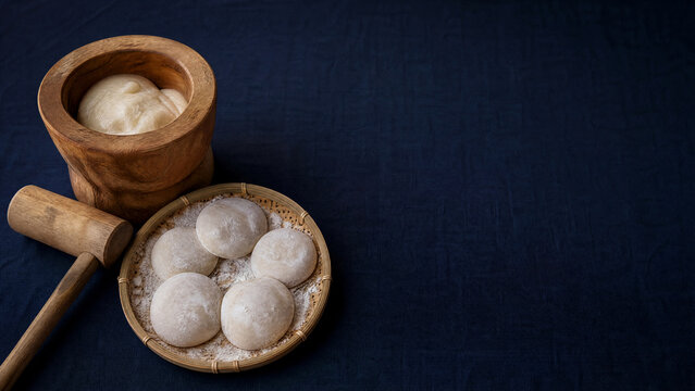 Wooden usu and kine with fresh mochi for Japanese mochitsuki