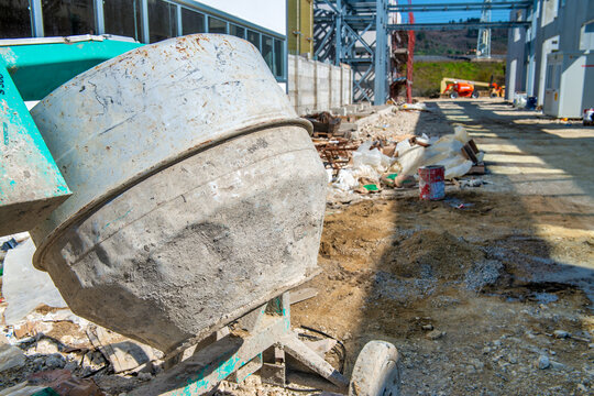 Industrial concrete mixer working on site during infrastructure and construction operations