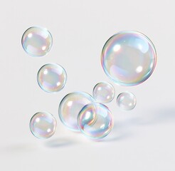 Obraz premium Colorful soap bubbles floating against white background