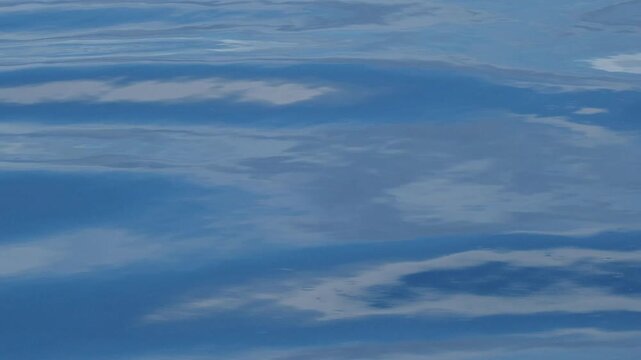 Calm sea surface with gentle waves. The Maldives