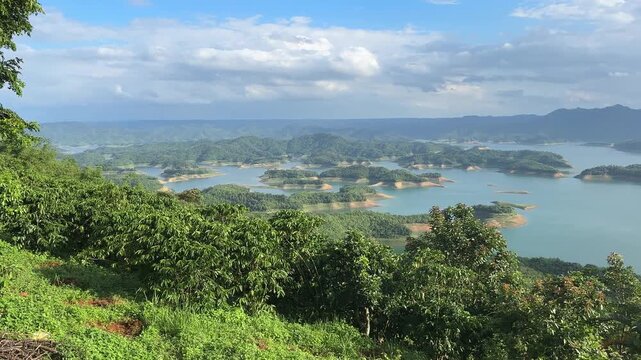 Panoramic view of Ta Dung Lake with green hills in Dak Nong, central Vietnam.