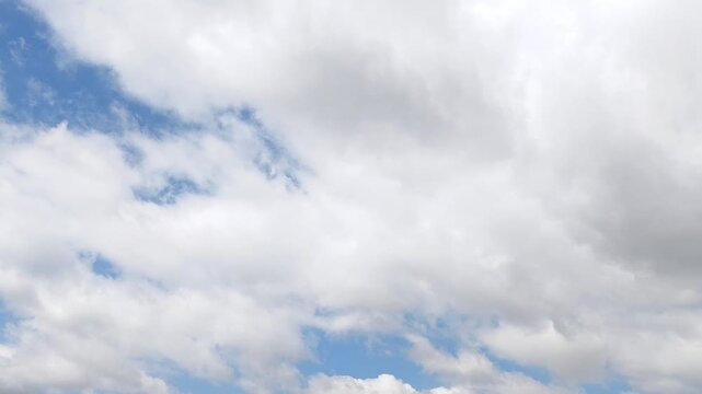 Greyish and some illuminated clouds covering the sky