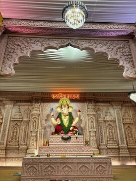 Beautiful Ganesh pandal in Indore, Madhya Pradesh, India, beautifully decorated for Ganesh Chaturthi 2026, showcasing a grand Lord Ganesha idol, vibrant festive decorations, traditional Indian cultura