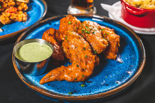 Spicy fried chicken wings with dipping sauce
