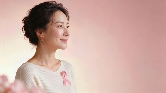 Breast cancer awareness banner with Asian woman and copy space