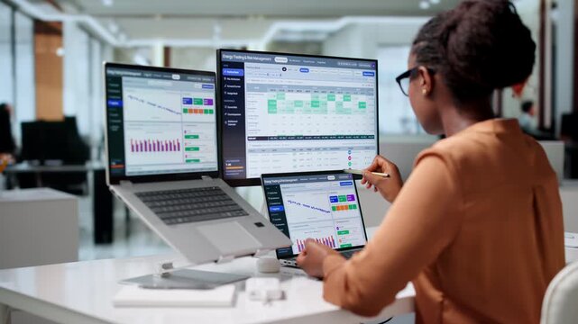 Energy Trader Woman Carefully Reviews Risk Management Data
