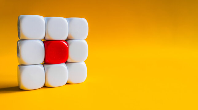 White and red blocks arranged in square grid pattern on yellow background with copy space