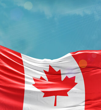 Canada flag banner waving in the sky.