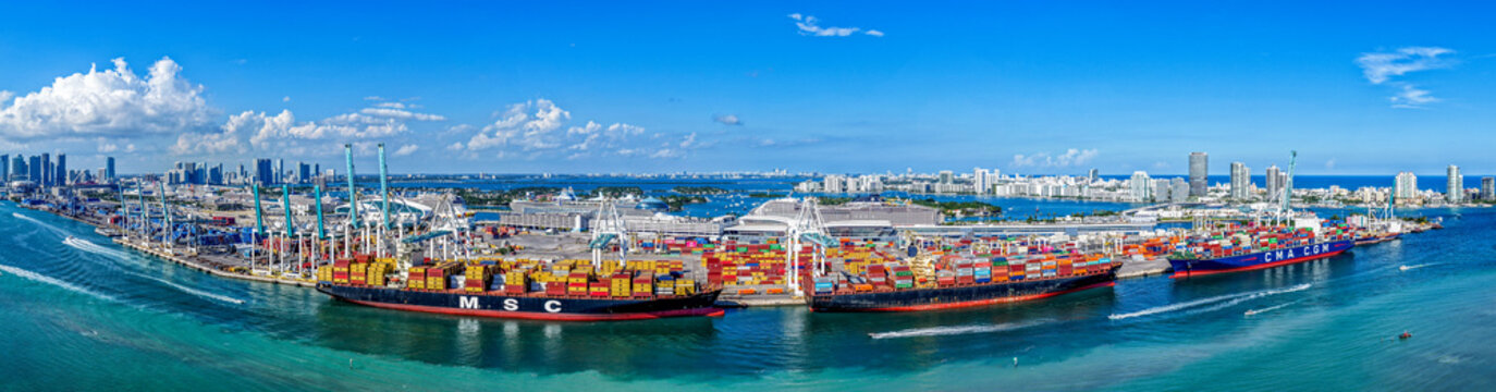 Miami, Florida, USA - November 08, 2025: Miami cargo port, Florida. Panoramic port in Florida. Miami port with cargo ship MSC and CMA CGM. Aerial panoramic view. Cargo ship docked in port of Miami