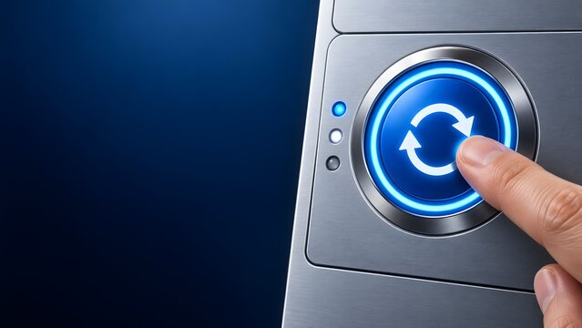 Finger pressing glowing blue reset button with refresh arrows icon on metallic surface representing system update or restart process.
