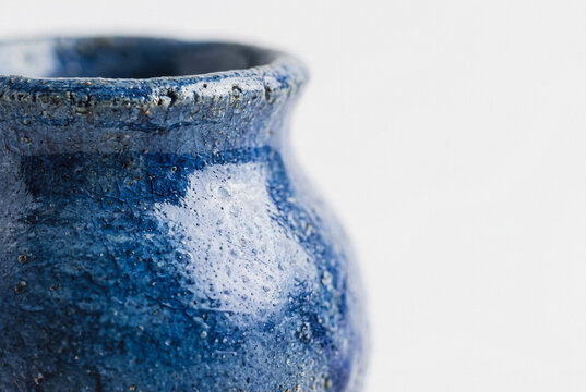 Blue ceramic vase with textured crackle glaze