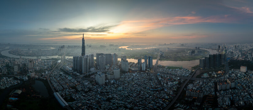 Landmark 81 and winding river in a wide skyline panorama, Ho Chi Minh City, Vietnam