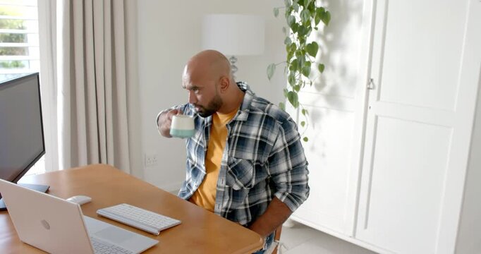 Lifestyle videos indoor of people doing activities at home, working from home, man using laptop and