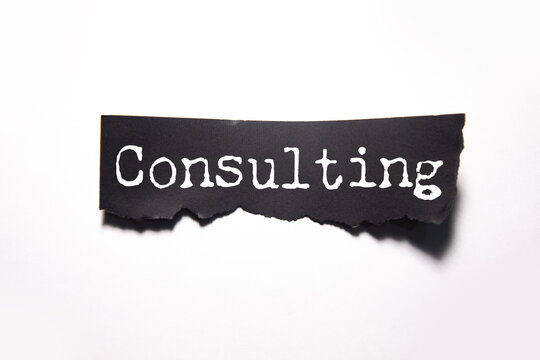 Consulting word written on paper
