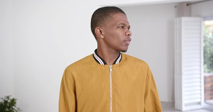High speed photography for dynamic scenes, looking confused and concerned, man in yellow jacket stan