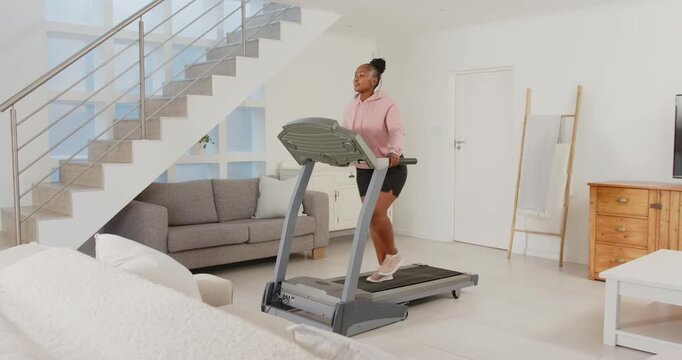 Lifestyle videos indoor of people doing activities at home, walking on treadmill, woman exercising i