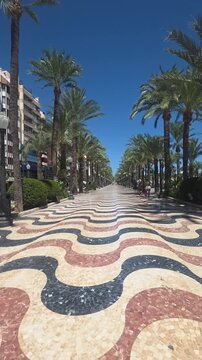 Alicante, Spain - 30 August 2026 - Wavy Pedestrian Walkway Along the Port of Alicante, Spain