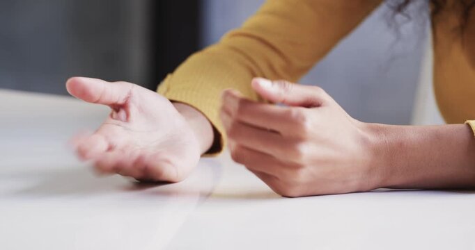 Close up of people talking to the camera, gesturing with hands, person explaining concept