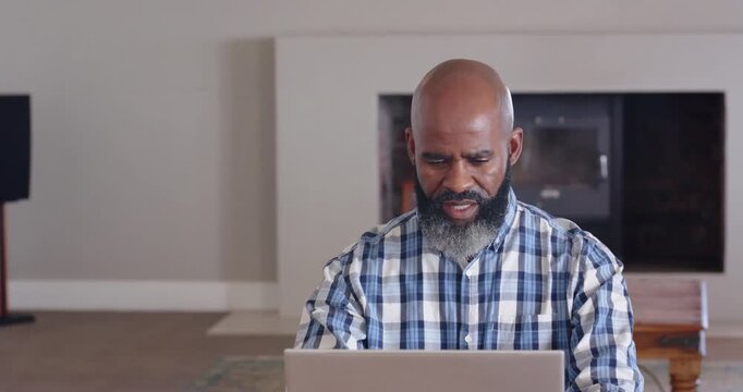Lifestyle videos indoor of people doing activities at home, Frustrated man using laptop at home, hol