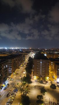 Valencia City Street at Night with Illuminated Buildings, Spai