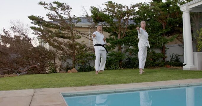 Lifestyle videos outdoor of people doing activities, practicing martial arts, two people in karate u