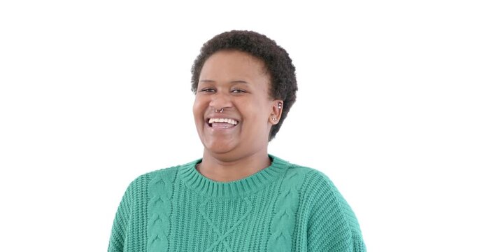 Smiling woman in green sweater enjoying joyful moment against white background