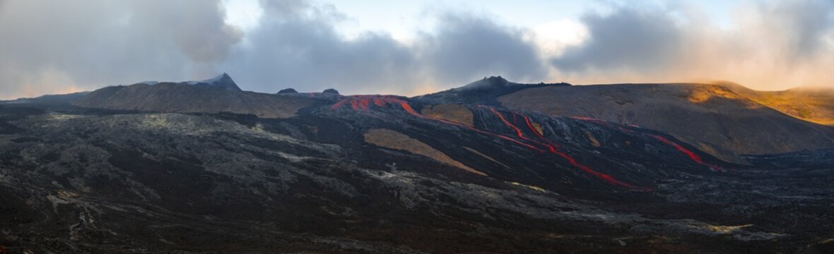 Erupting volcano with lava fountains and lava field, crater with erupting lava and lava flow, Fagradalsfjall, Kr&yacute;suv&iacute;k volcano system, Reykjanes Peninsula, Iceland