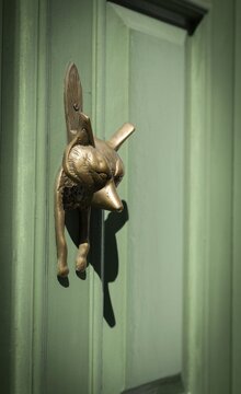 Light green, coffered door with fox shaped brass door knocker and house number 33, Chelsea, London, Great Britain, England, Great Britain