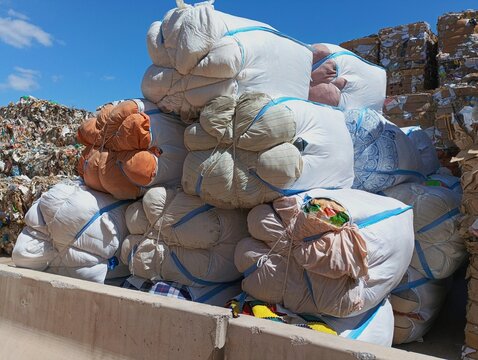 Bales of recycled clothing ready for reuse 
