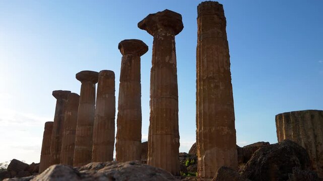 Temple of Heracles columns at sunset in Agrigento Sicily