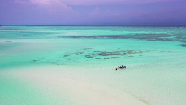 Boats and visitors on a Zanzibar tidal sandbank