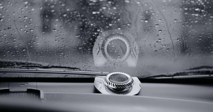 Cinematic black and white footage highlighting heavy rain and detailed raindrops. This moody monochrome video features wet surfaces and dark atmosphere, good for dramatic or melancholic concepts.