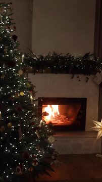 Atmospheric Christmas Living Room with Burning Fireplace and Star Light video. Holiday Magic, cozy home eve. Hygge Warm Evening, winter celebration. 
