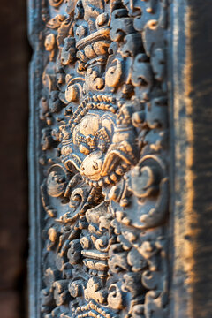 Detail of bas-relief stone carvings in Banteay Srei temple, the citadel of women in Angkor, Siem Reap, Cambodia