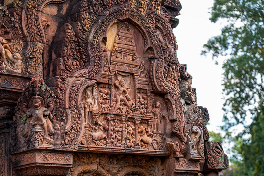 Detail of bas-relief stone carvings in Banteay Srei temple, the citadel of women in Angkor, Siem Reap, Cambodia