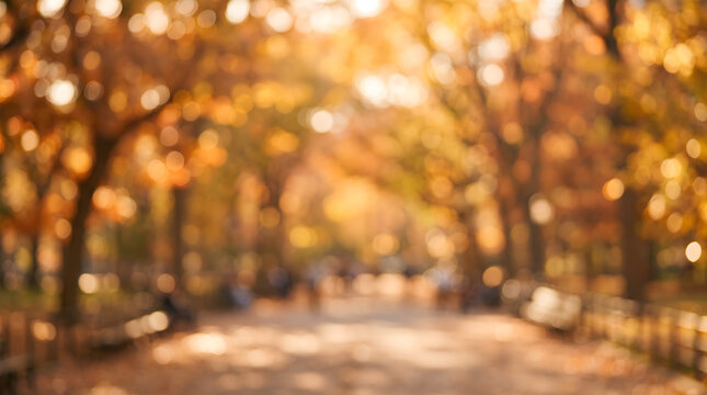 Defocused Autumn Park Background with Golden Bokeh and Falling Leaves