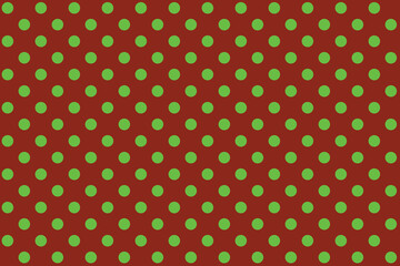 texturised Green colour polka dots pattern over crimson Orange Red colour useful as a background. © Pisan