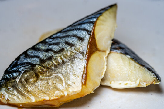 Close-up view of Japanese style grilled mackerel saba fish fillet.